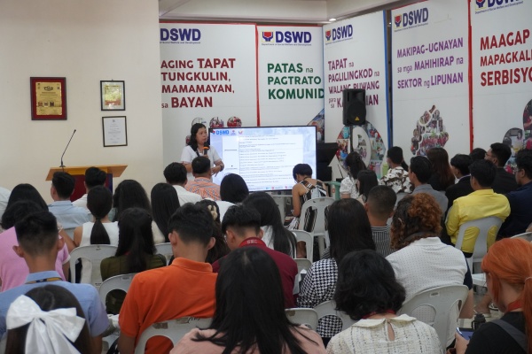 Ms. Norilix M. Razalan, Training Specialist IV and OIC Chief of the Knowledge Management Division of SWIDB providing overview of the DSWD.
